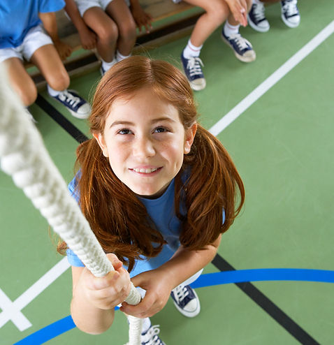 Girl climbing rope