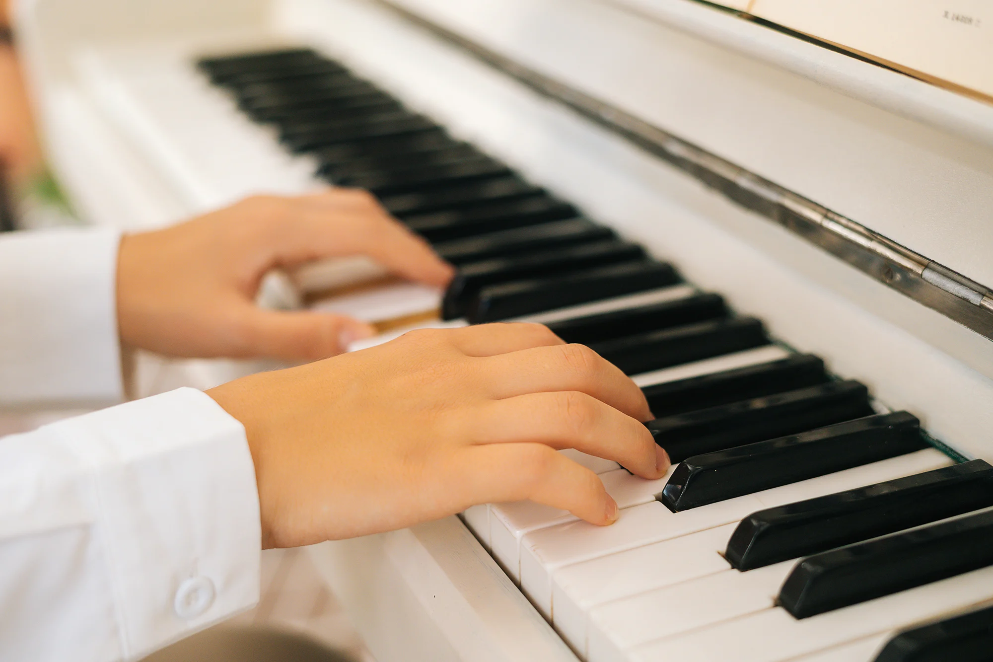 extreme-closeup-hands-of-unrecognizable-female-musician-performer-playing-on-classical-pia