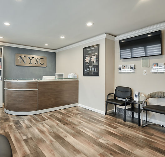 Front office of New York Spinal Correction with online consultation form for scheduling new chiropractic patient appointments in New York.