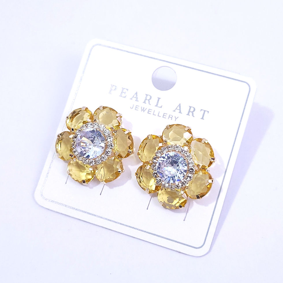 Colorful flower-shaped stud earrings featuring a large central sparkling AD stone and vibrant gemstone petals.