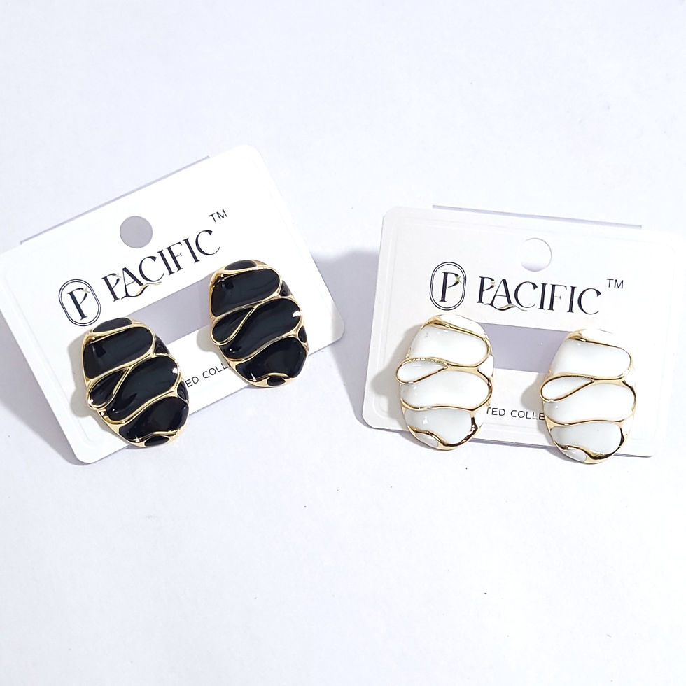 Pair of oval enamel stud earrings with decorative gold-toned ribbon swirls in black and white.