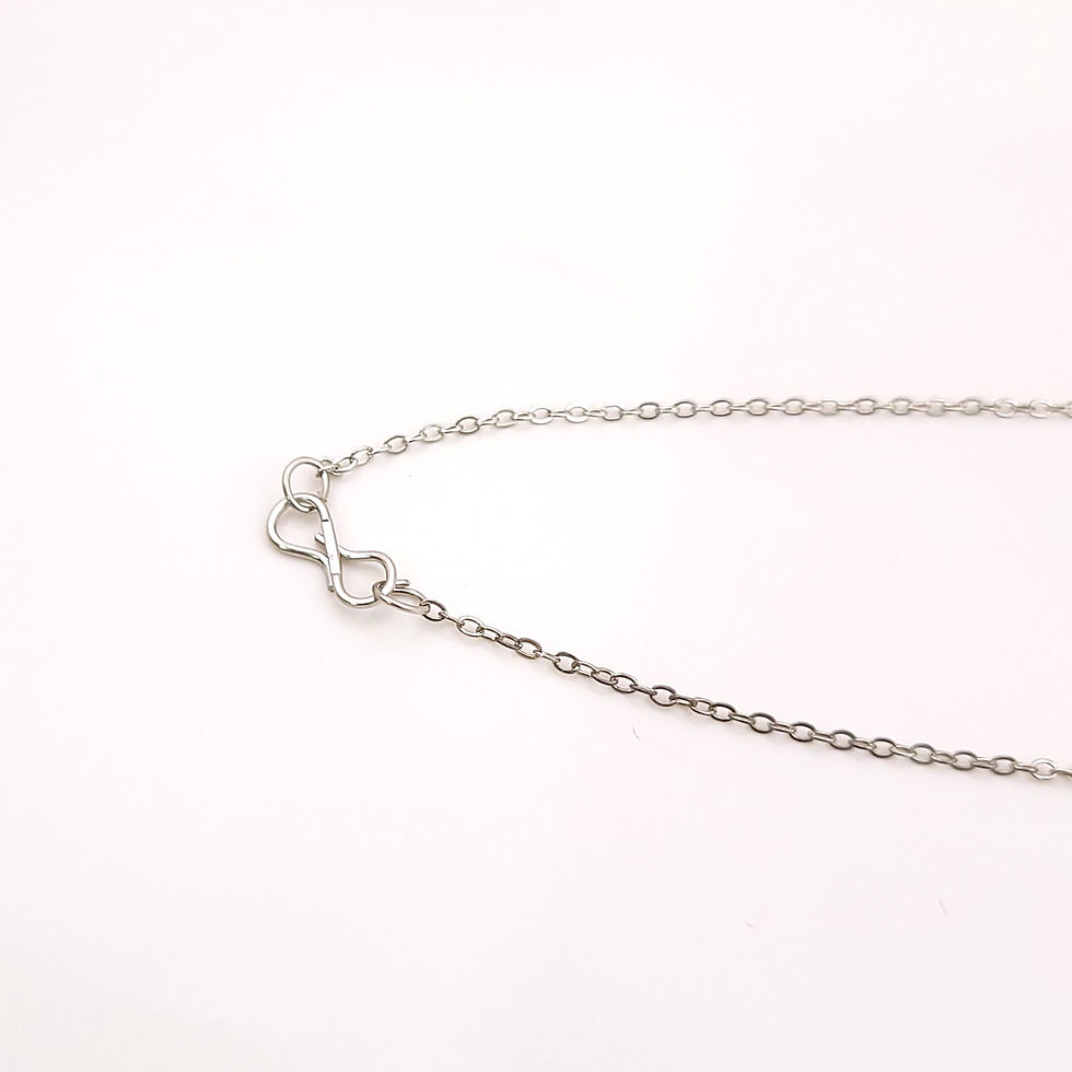 Thumbnail: Silver plated floral pendant necklace set with crystal stud earrings display.