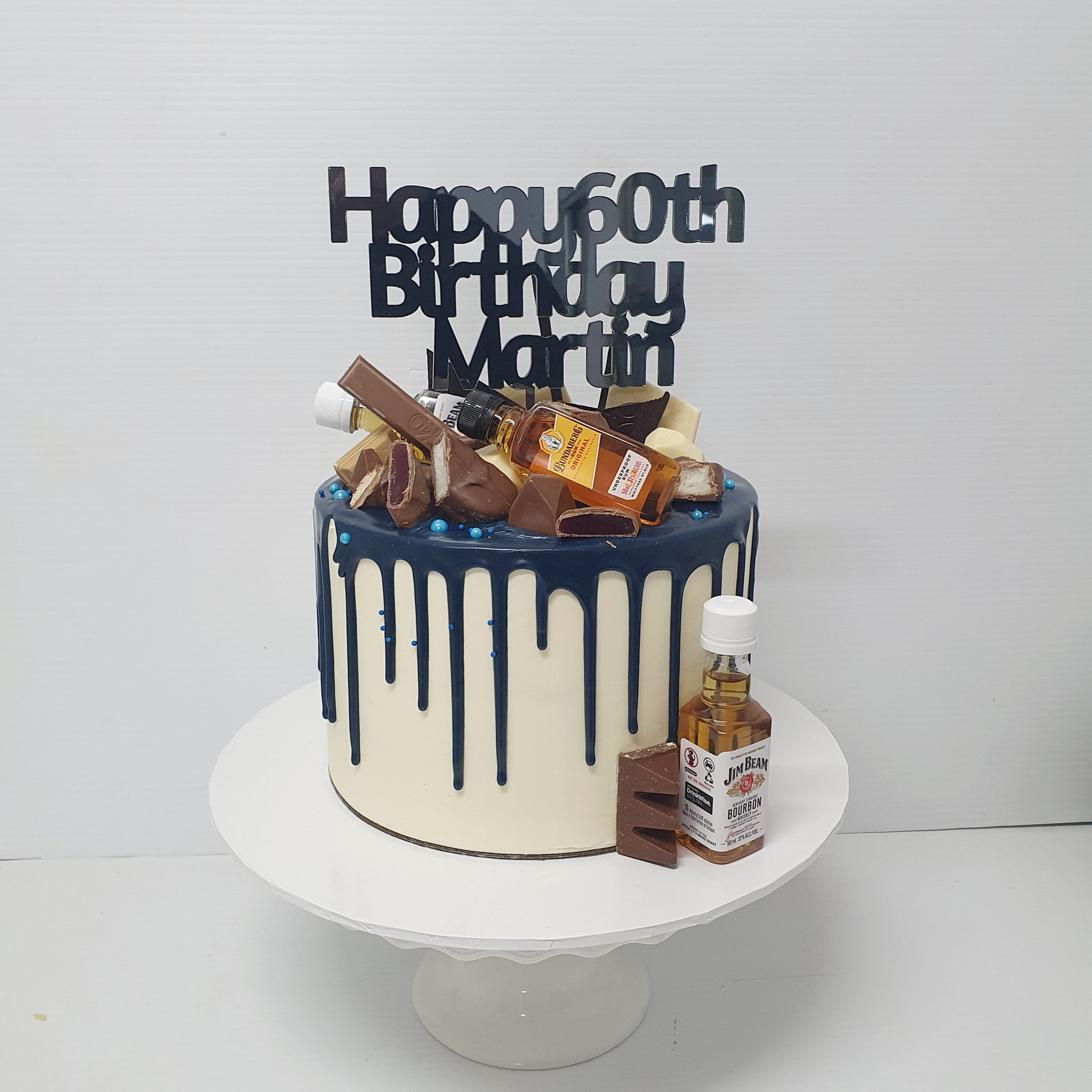 Mini bottles drip cake