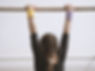 Gymnast on a Wooden Bar
