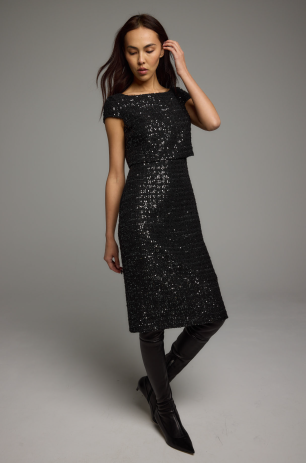 shimmering black dress with black pants and black dress shoes