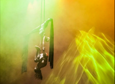 Aerial Silk performance Miami with woman lifting man