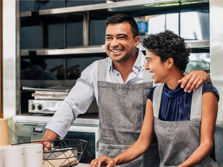 Immigrant business owners managing their company in Canada