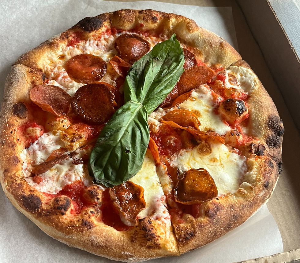 A fabulous small Margherita pizza ($14) for us to share. We just loved it!