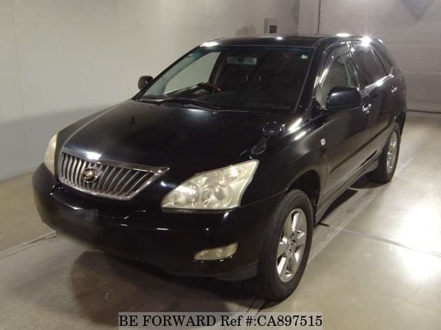 A grey JDM sports car speeding down a highway at night.