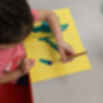 autistic child practcing handwriting in occupational terapy