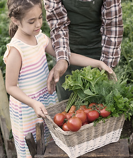 Child Carrying Vegetables