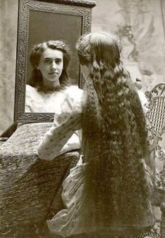 old photo of woman with long hair