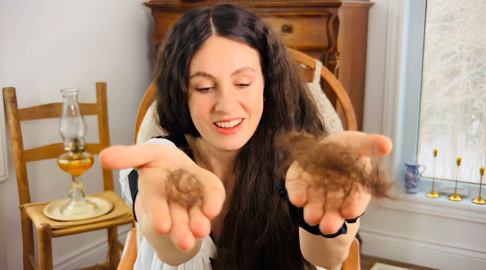 Woman with long dark hair smiling and holding clumps of shed hair in her hands before and after comparison, showing dramatic reduction in postpartum hair shedding after using raw egg hair wash