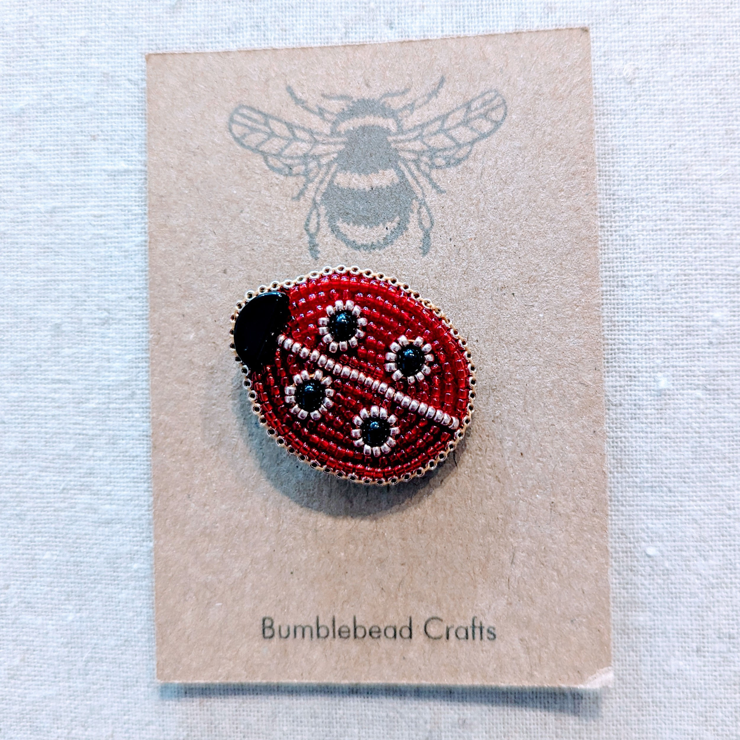 Handcrafted beaded ladybird brooch