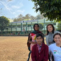Spending time with a male student with a disability during a community visit