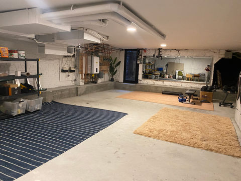 slab on grade on ground lowering in basement or cellar of brownstone to increase floor to ceiling height