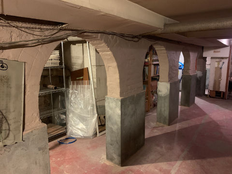 structural repairs of masonry arches in cellar due to aging strutcure