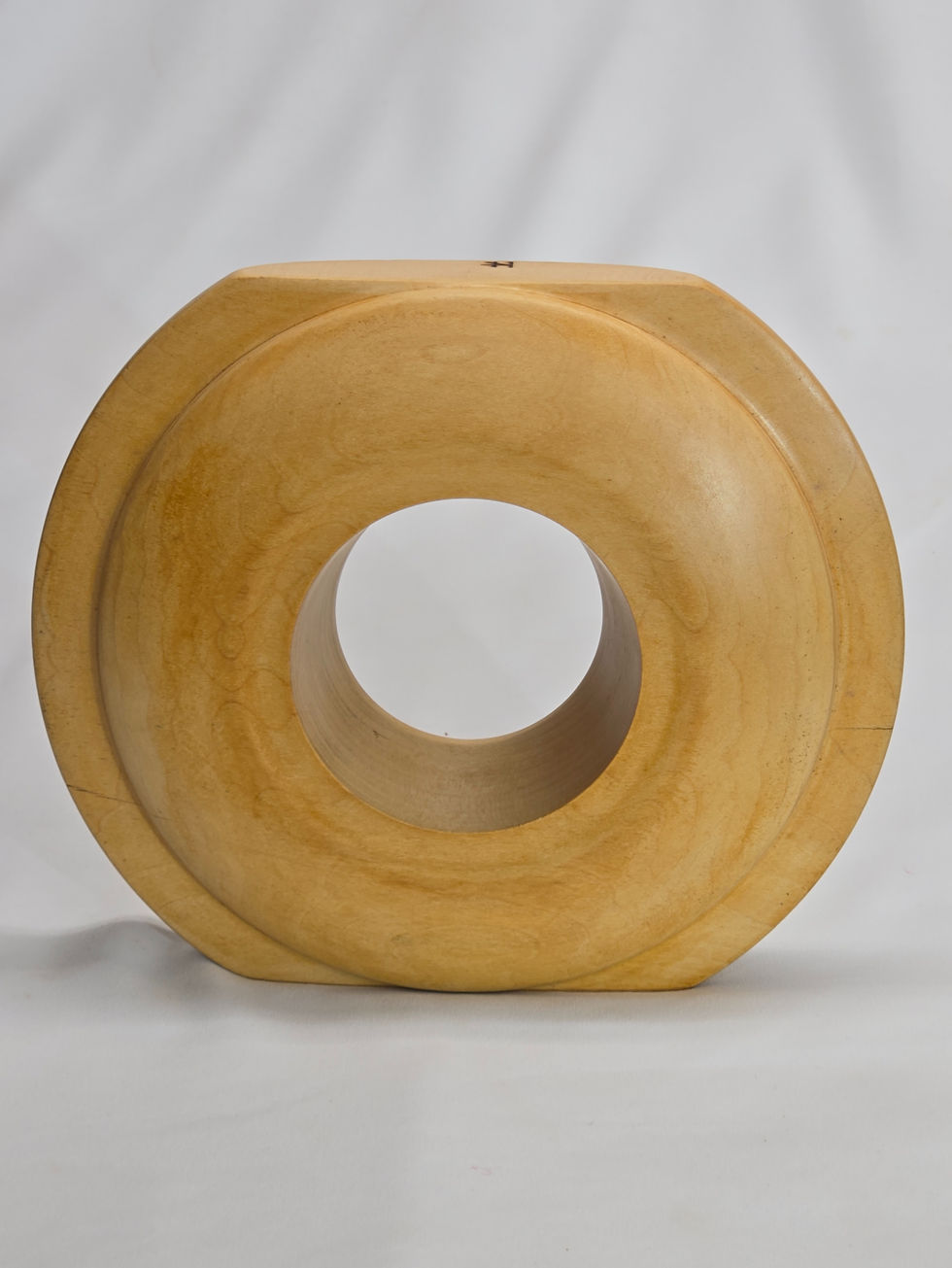 Maple Decorative Art Elegant curves highlight the strong yet smooth grain pattern and the lovely light creamy color.