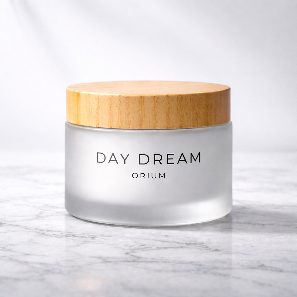 Day Dream Oriam cream in a frosted glass jar with wood lid