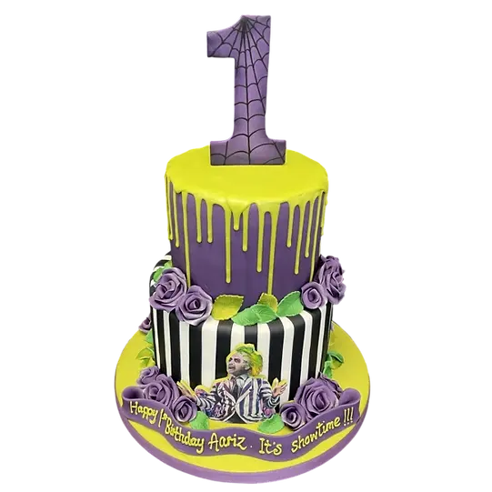Bespoke Beetlejuice-themed cake with black and white stripes and green accents, crafted in Solihull, West Midlands.
