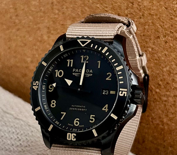 Pagoda tactical watch with engraved backplate showing Union Jack and Stars & Stripes—veteran-owned brand built for elite performance and military heritage.