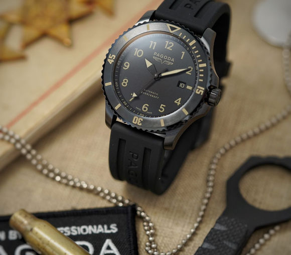Pagoda tactical watch with engraved backplate showing Union Jack and Stars & Stripes—veteran-owned brand built for elite performance and military heritage.