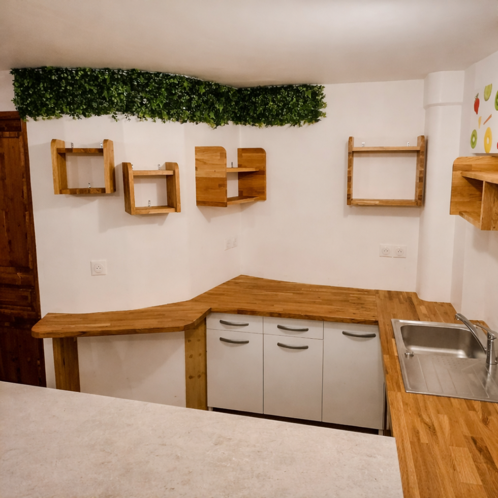 Cozy kitchen with wooden shelves and green accents.