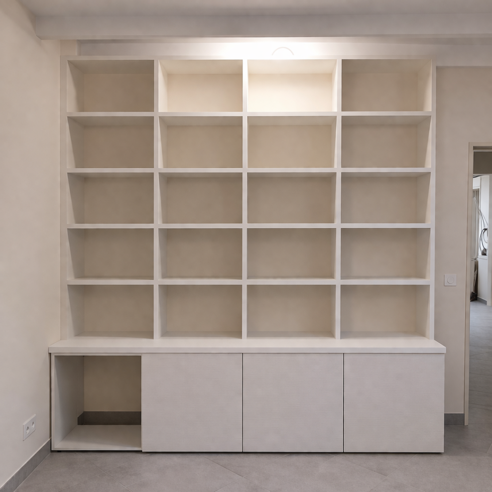 White built-in shelving unit with cabinets below.