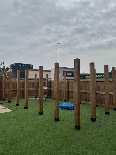 Pergola support posts installed and aligned for custom pergola construction in Edmonton
