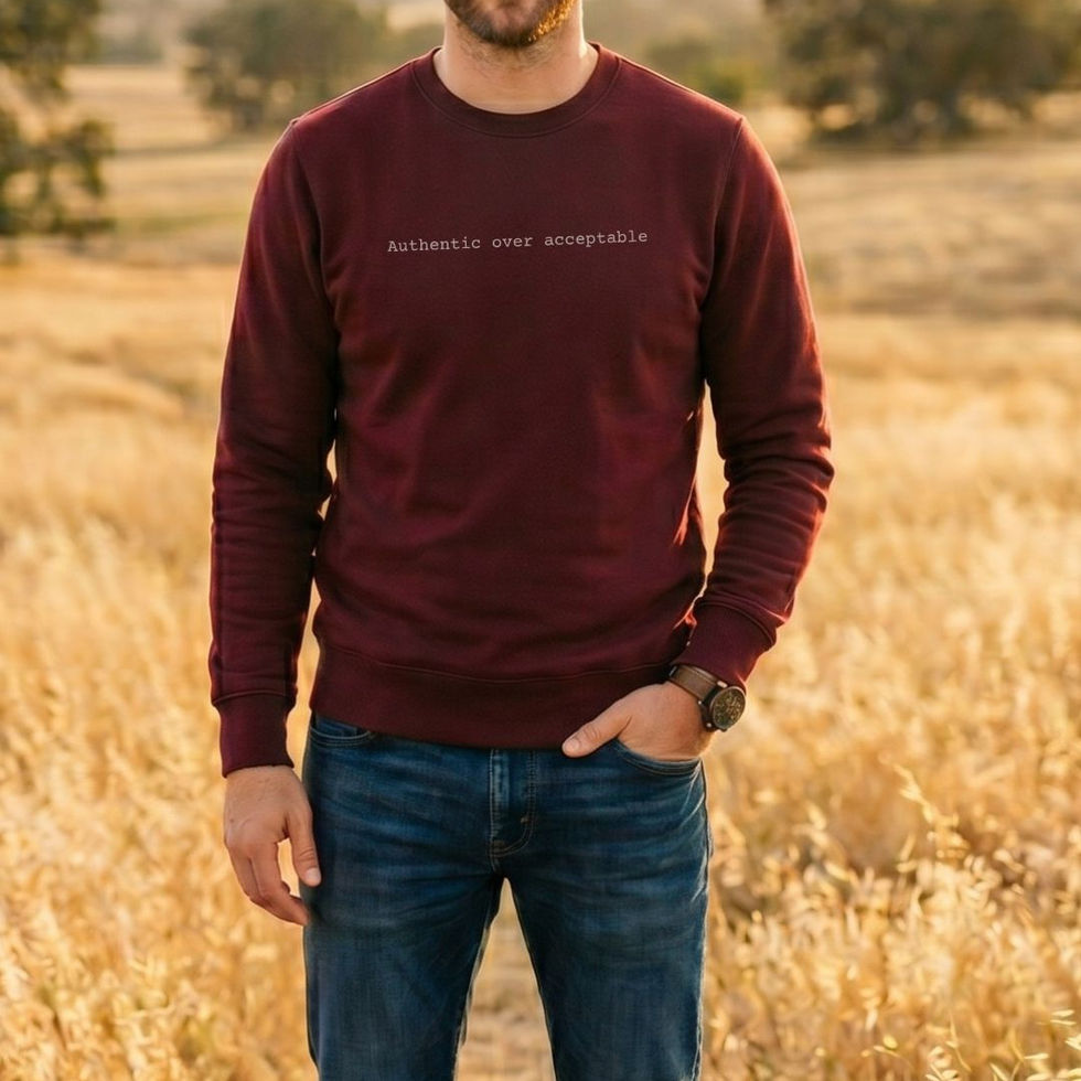Man wearing "Authentic Over Acceptable" Minimalist Spiritual Awakening Sweatshirt in maroon by Visual Awakening Art