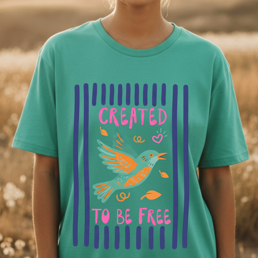 Woman wearing Island Reef Retro Striped Frame "Created to Be Free" Shirt with bird