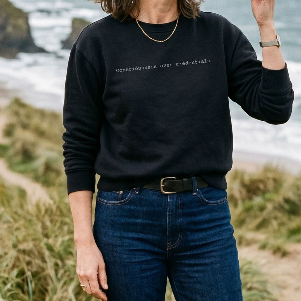 Woman wearing "Consciousness Over Credentials" Minimalist Spiritual Sweatshirt in black by Visual Awakening