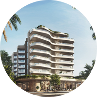 Modern building with wavy design, palm trees, and clear sky, Carrington Place.