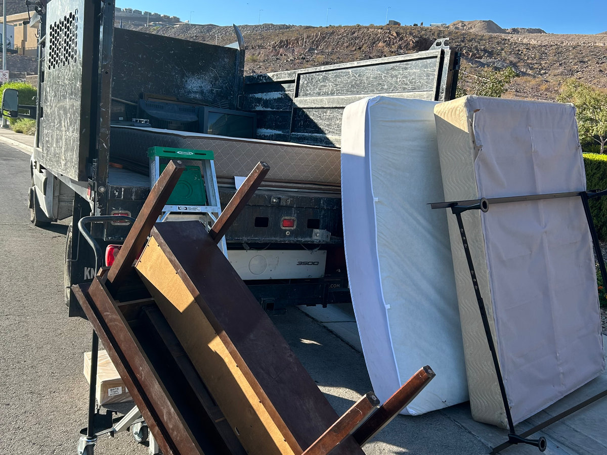 Junk piled next to a junk truck in Las Vegas