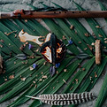 A sacred fire in a copalero with a native american flute and feather.