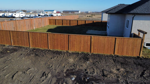 large wood 6x6 fence in new development