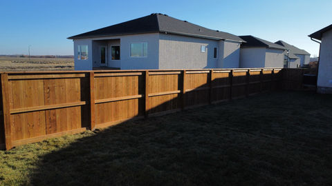 large wood 6x6 fence in new development