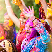 A vibrant, colorful festival scene.