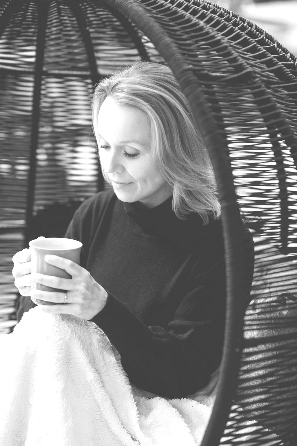 woman drinking her tea contemplating her health