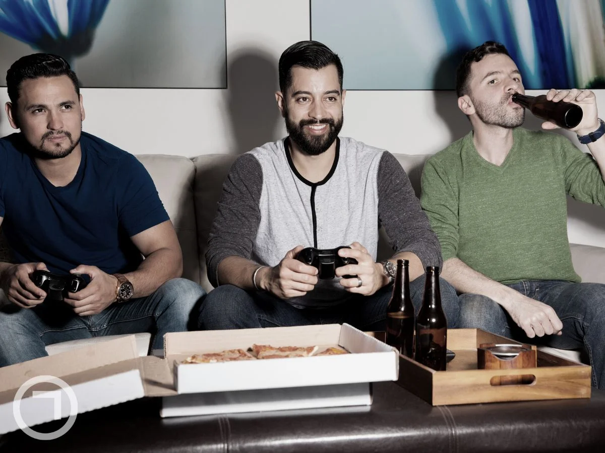 3 friends playing video games together