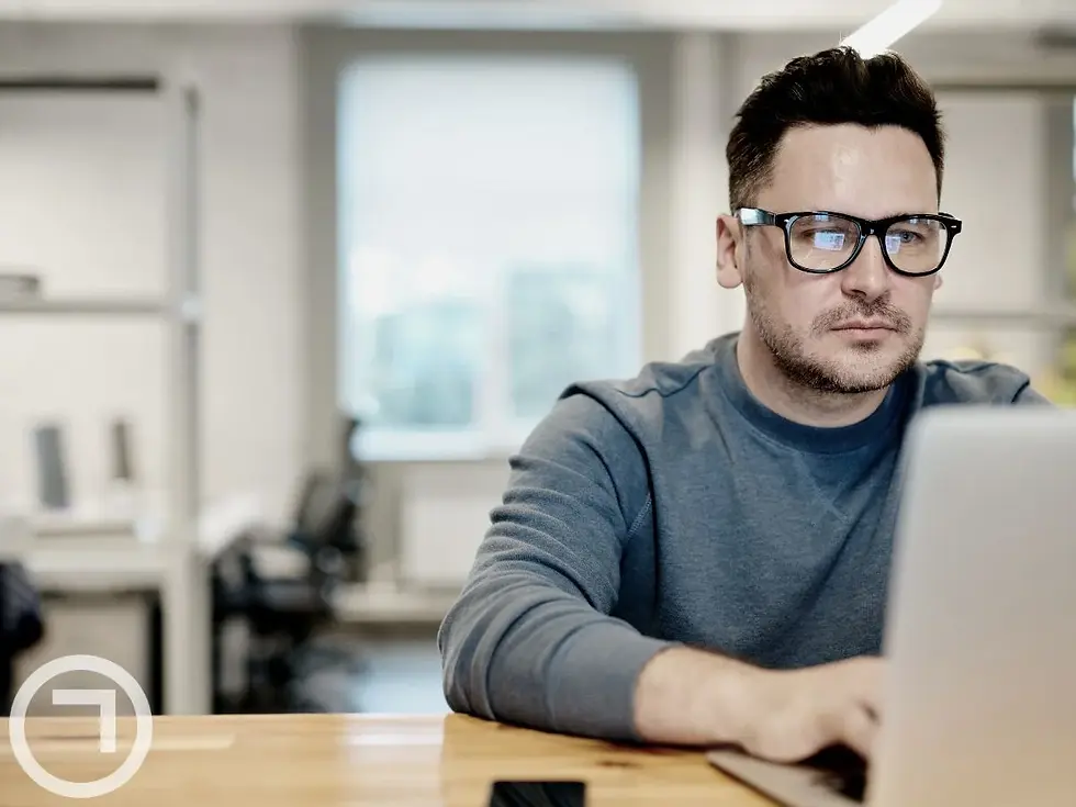 A man working on his laptop