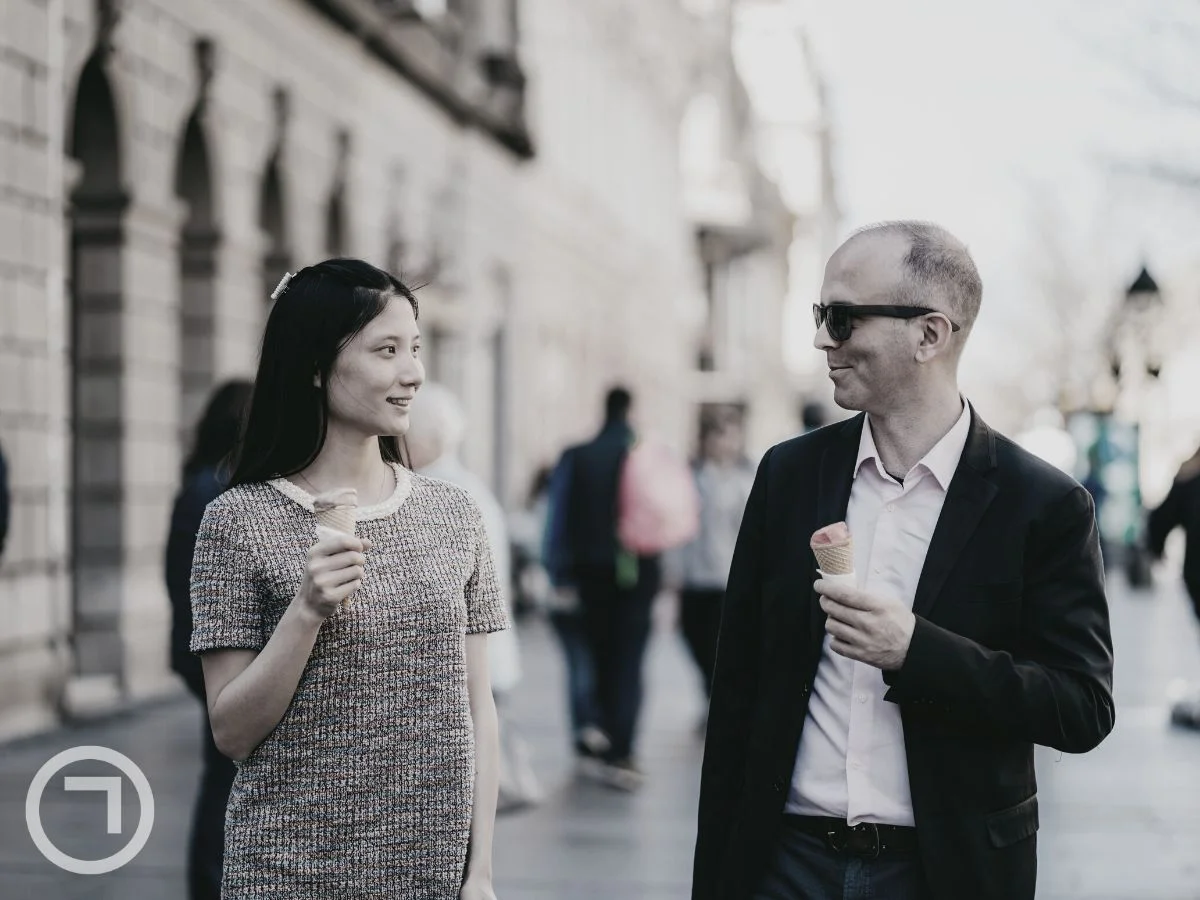A man and a woman eating ice creams