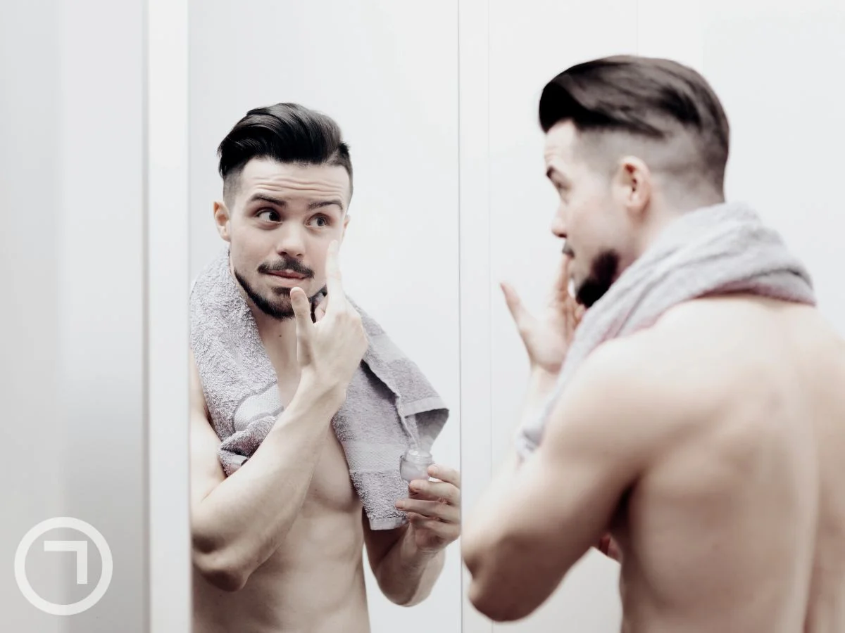 A man doing skincare