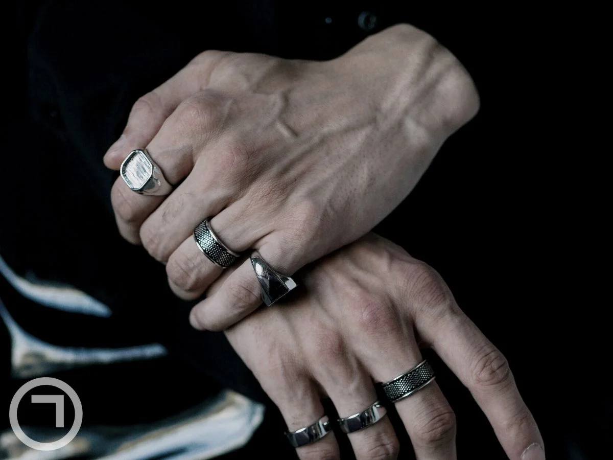 Rings on a man's fingers