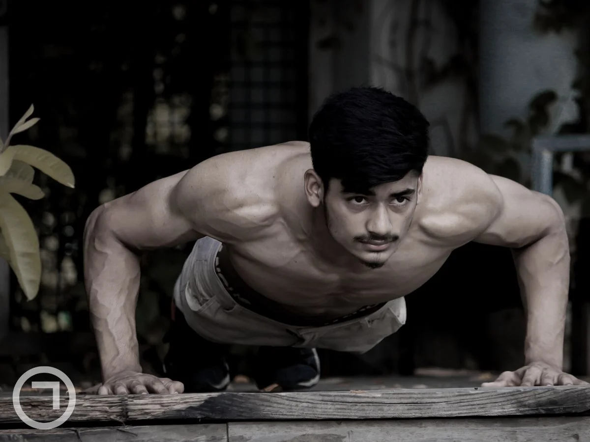 A boy doing pushups