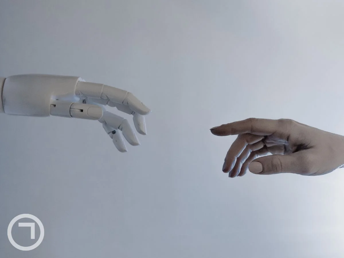A robotic hand and human hand