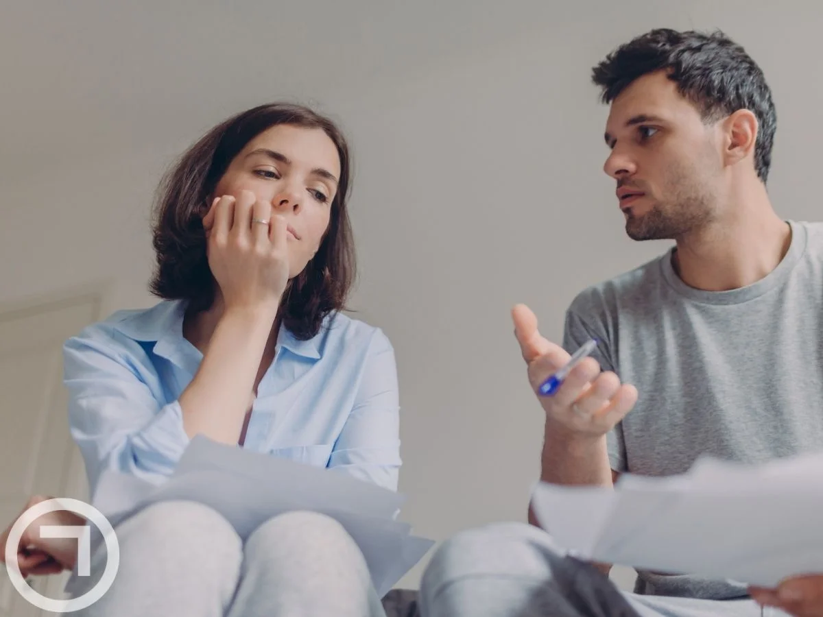 A couple discussing something
