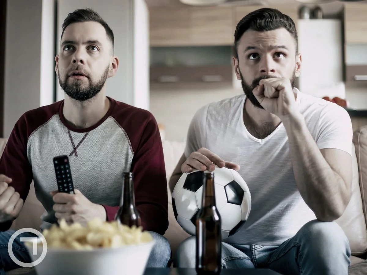 Two friends watching something together