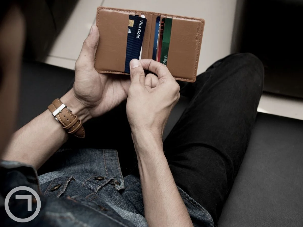 A card holder in someone's hand