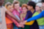 diversity-group-putting-their-hands-together-as-team.jpg